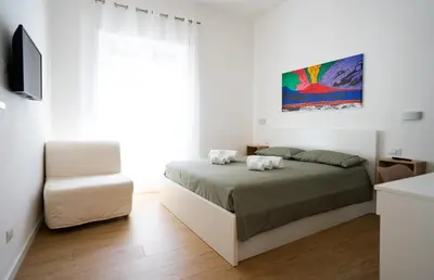 Letto o letti in una camera di La casa di Toto